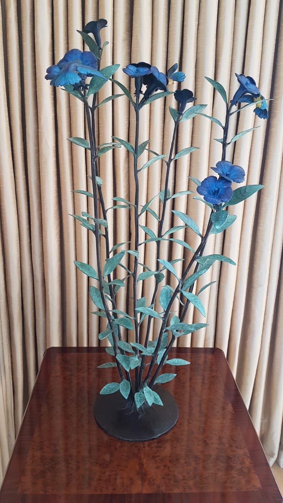 Hummingbird sculpture flowers