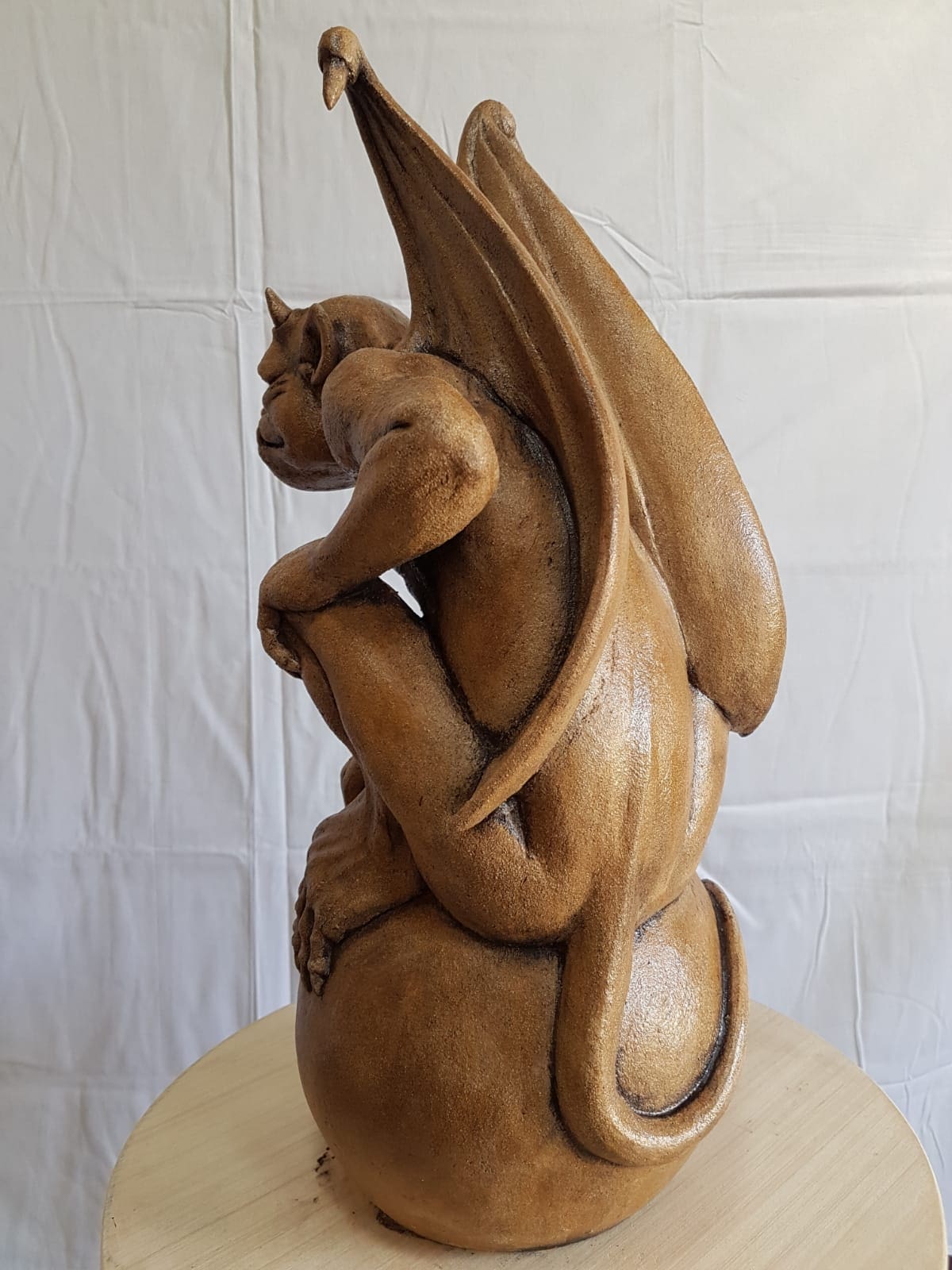 Back view of gargoyle goblin sculpture