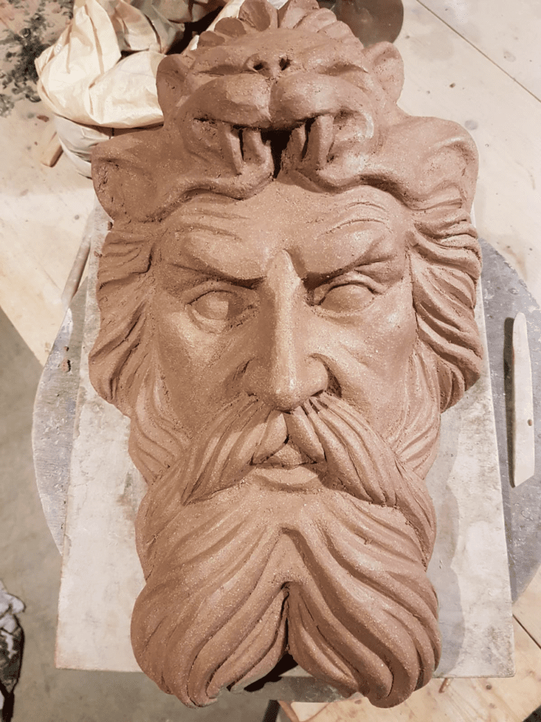 Hercules and the Namean Lion head dress sculpture by Michael C Keane Irish Sculptor